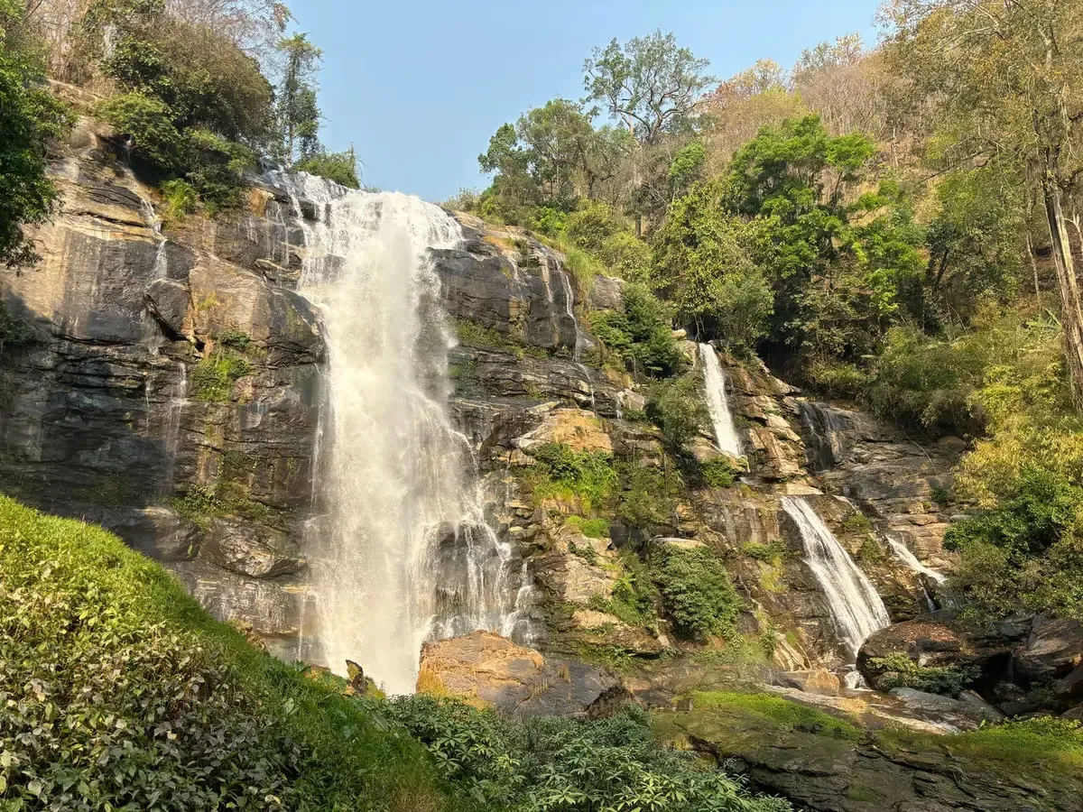 Wachirathan Waterfall pouring over a rock cliff